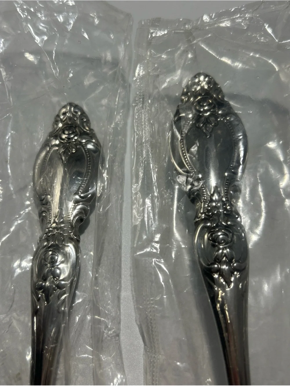 Oneida Silver Tone Decorative-Handle Serving Spoon and Fork Set